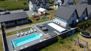 Apartamenty Maja -Pokoje - Domy wakacyjne -Basen Podgrzewany -Jacuzzi - Sauna, Łeba